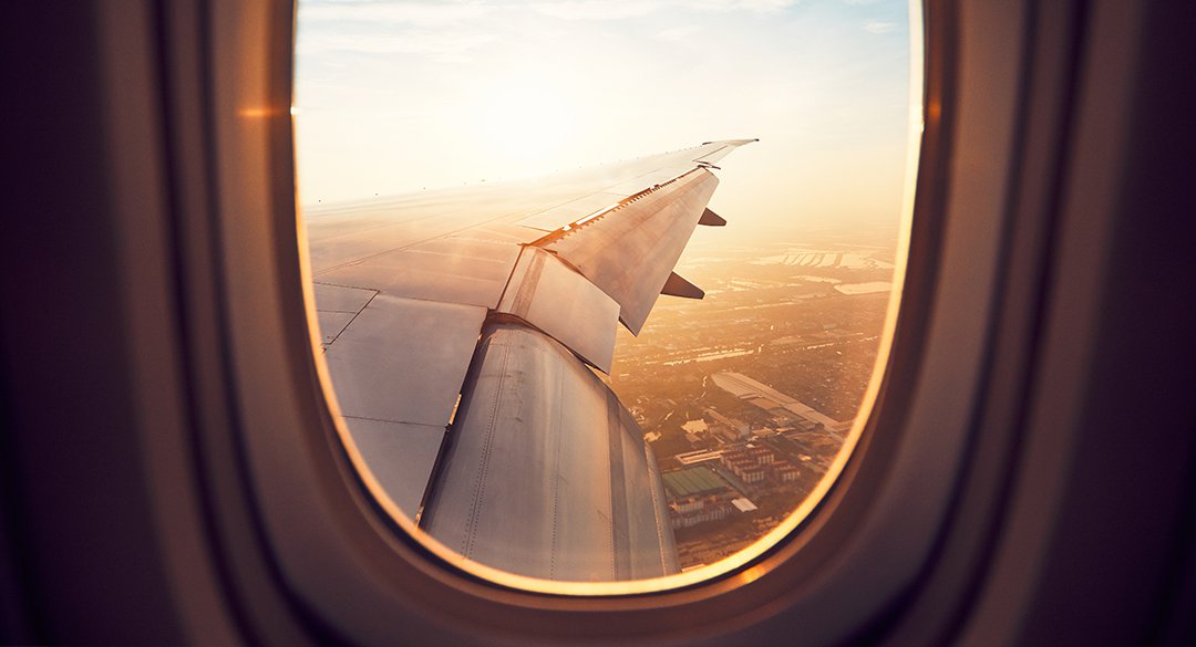 Looking out the window of an airplane