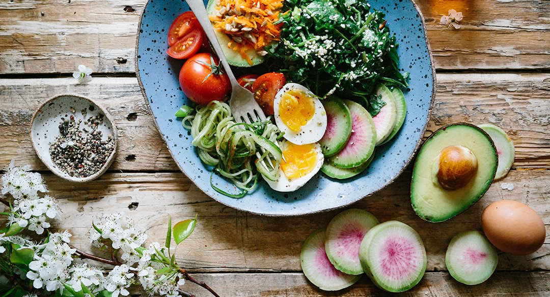 Bowl of healthy food sitting on table
