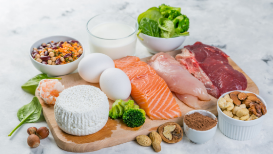 A cutting board with fresh low sodium proteins like fish, meat, lentils and more-14.png