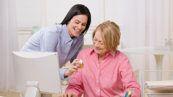 A daughter is seen helper her mother order prescriptions online-1.png