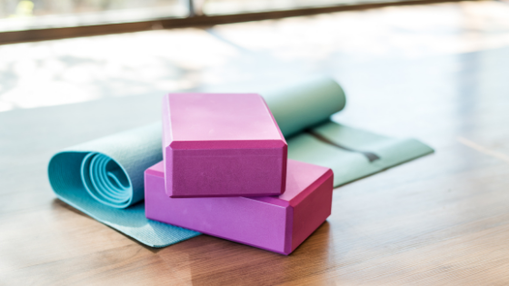 A yoga mat and yoga blocks-2.png