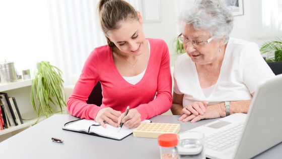A young woman helps an elderly woman track and manage her medications-10.png
