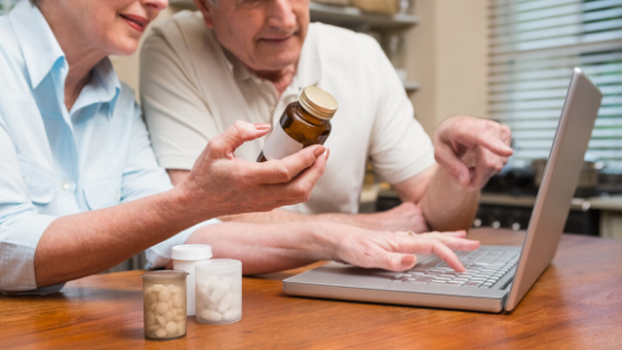 An elderly couple is seen ordering prescriptions online-2.png