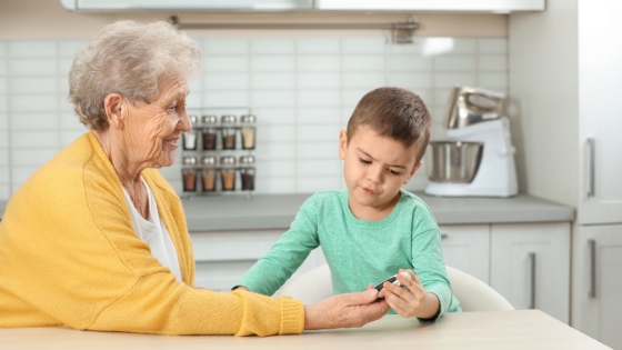 An elderly woman and her young grandson measure her blood sugar levels-7.png
