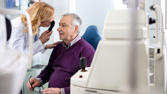 An ophthalmologist gives an eye exam to an elderly man-3.png