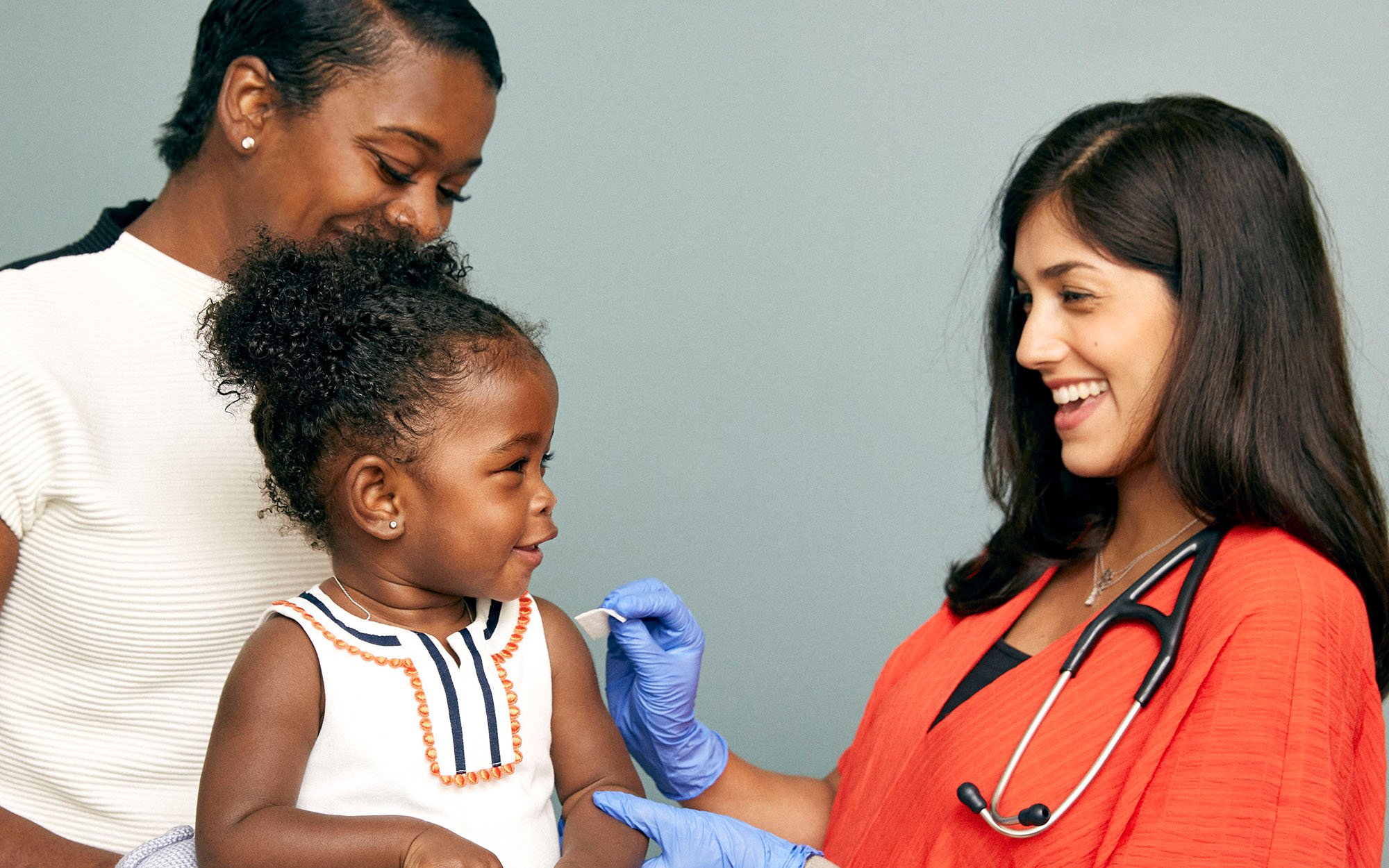 Baby recieving vaccine shot.jpg