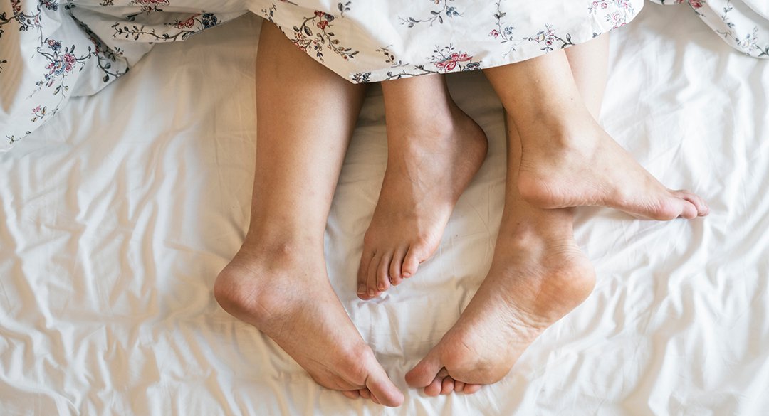 Feet in bed