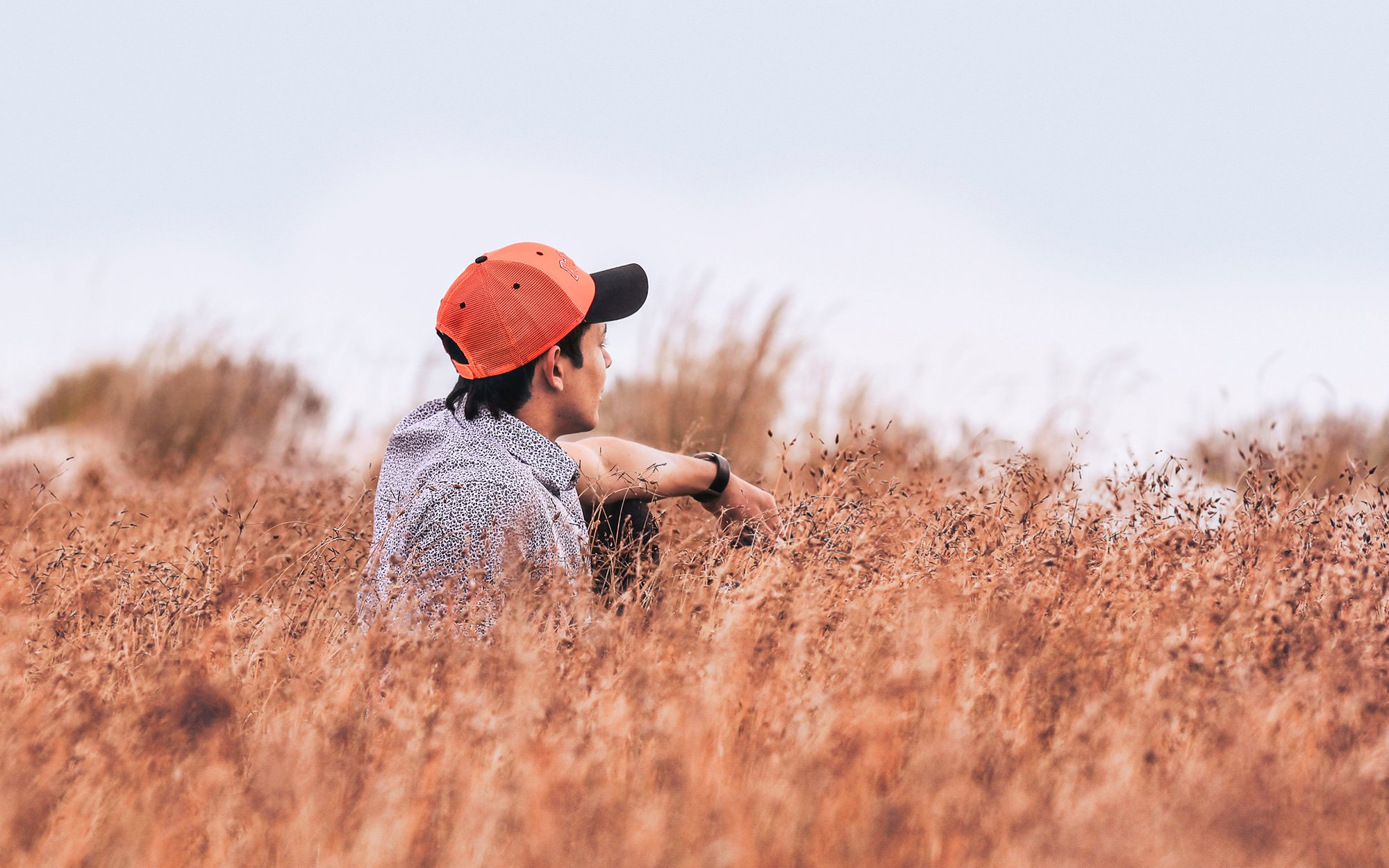 Man sitting in field.jpg