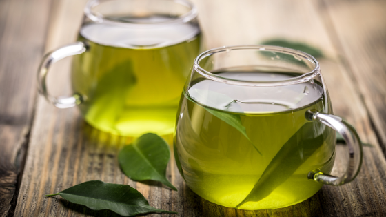 Two cups of freshly brewed green tea-11.png