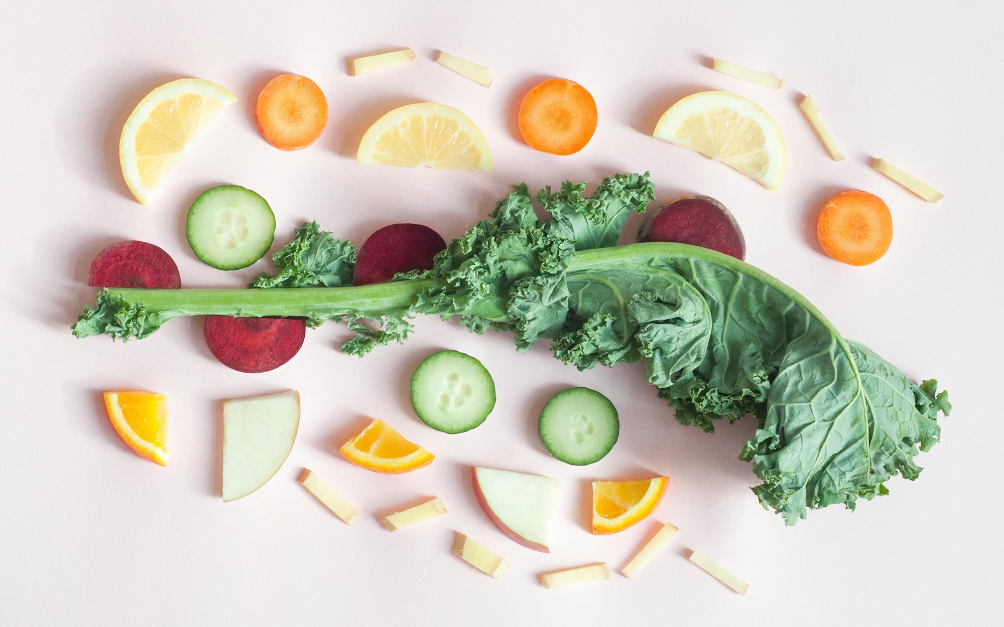 Veggies on pink surface.jpg