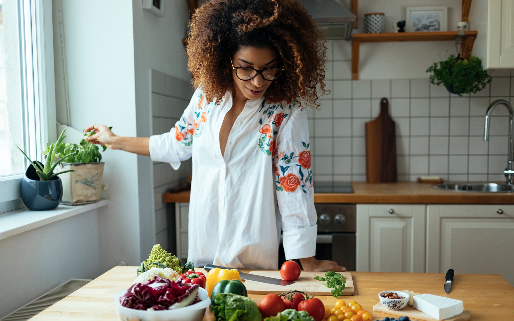 https://www.onemedical.com/media/images/Woman_cooking.original.jpg