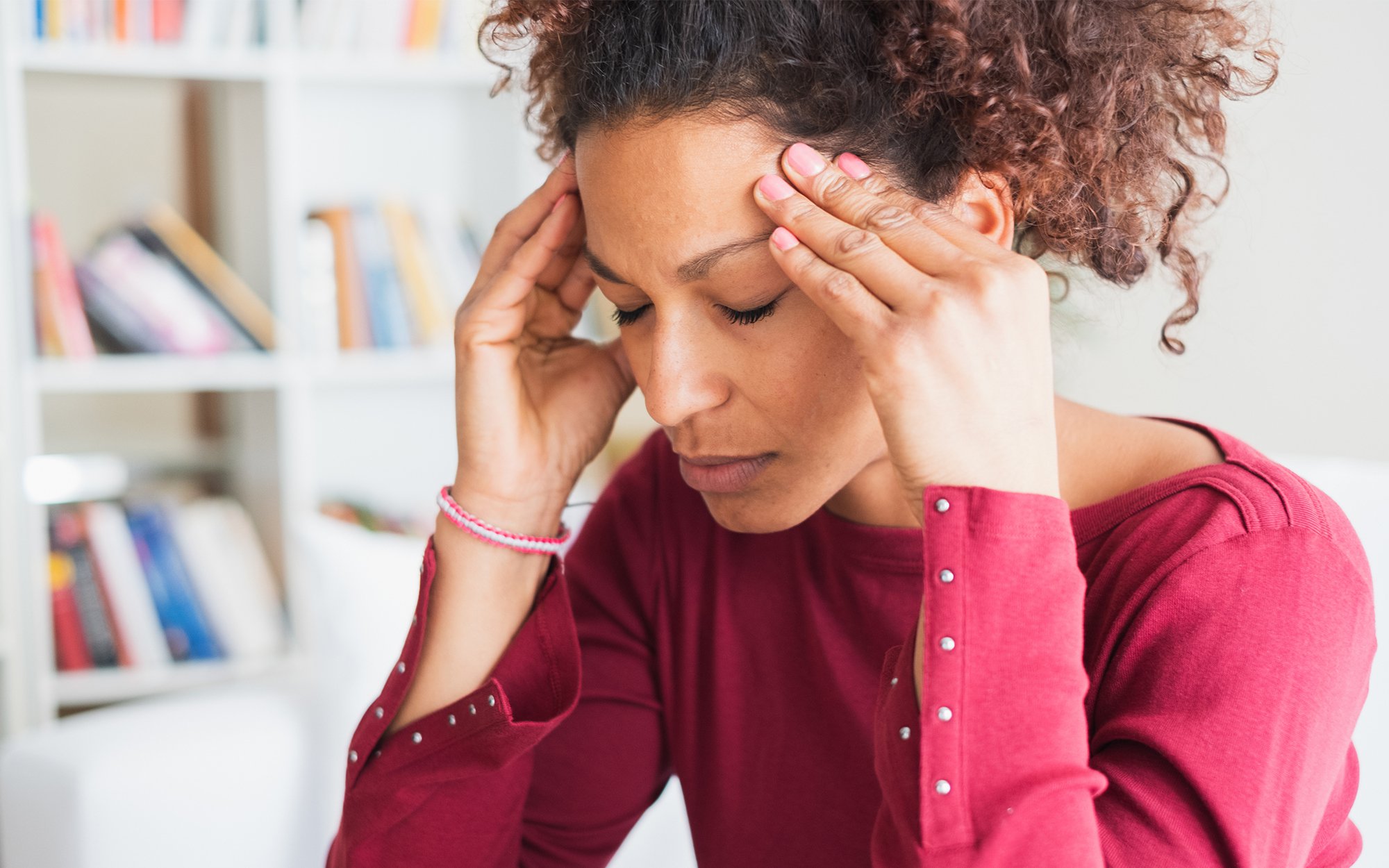 Woman holding her head.jpg