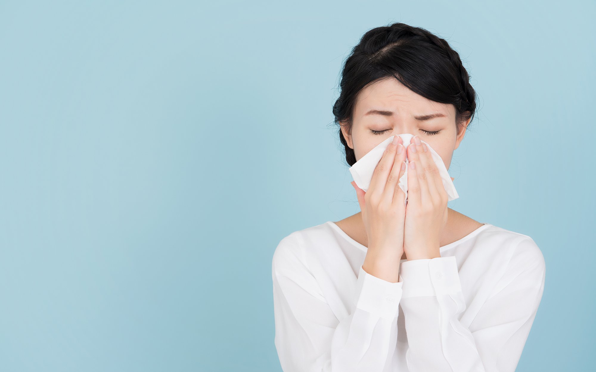 Woman with tissue.jpg