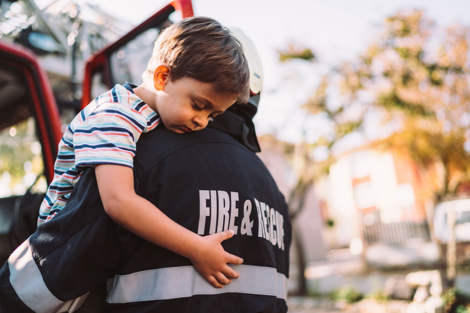 fireman-holding-boy.jpg