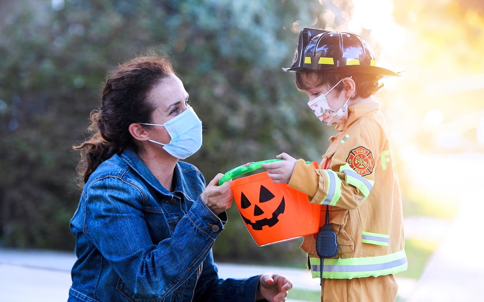 Woman and child with halloween candy