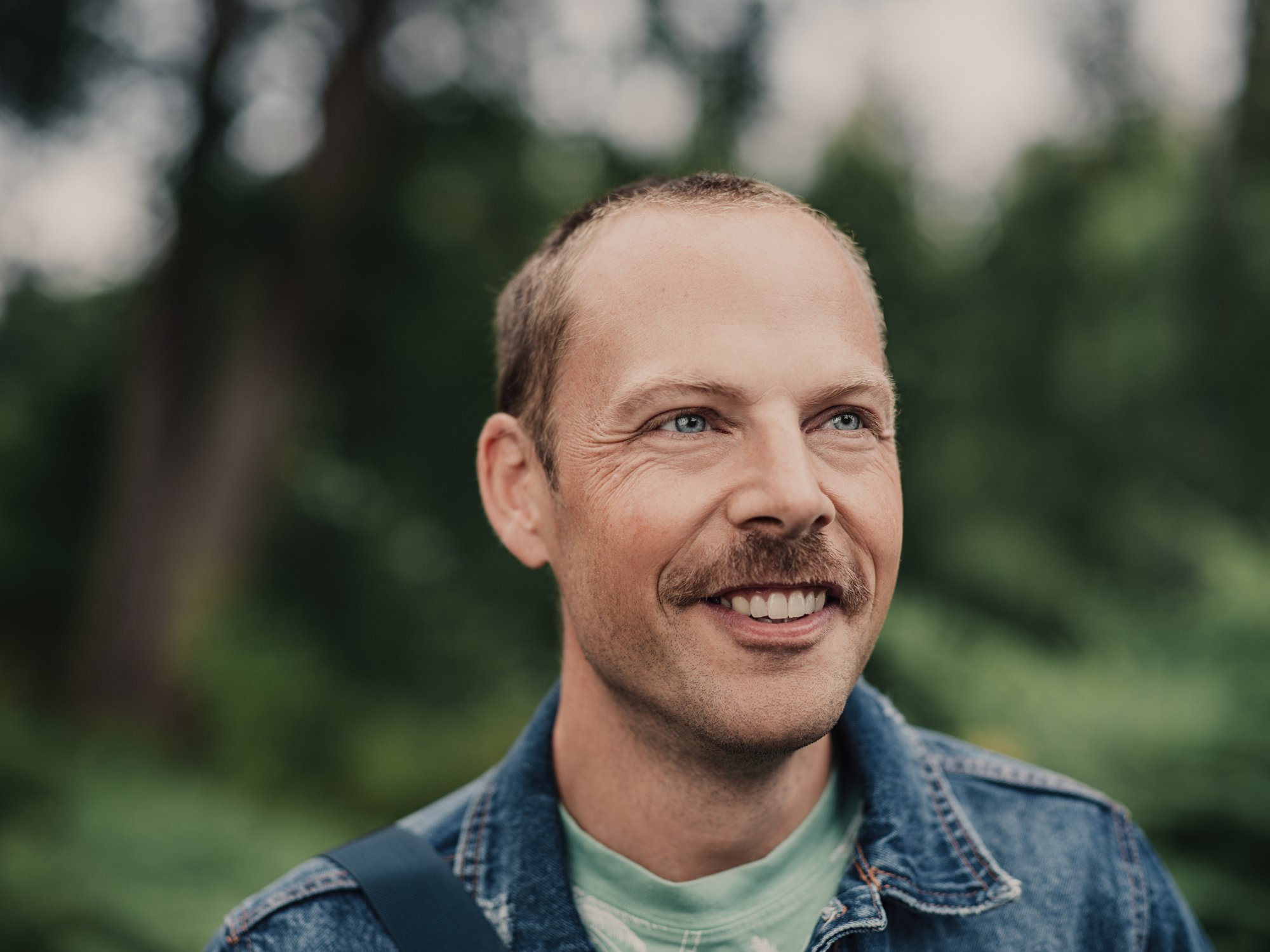 man with mustache smiling.jpg