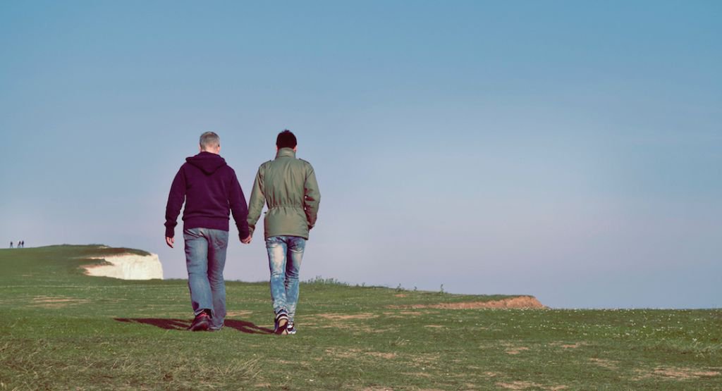 LGBTQ couple holding hand