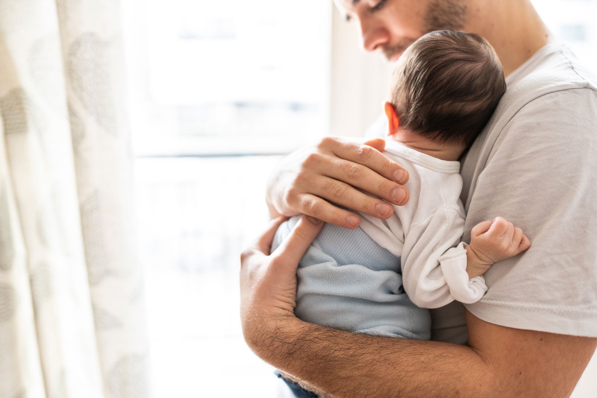 man-holding-baby.jpg