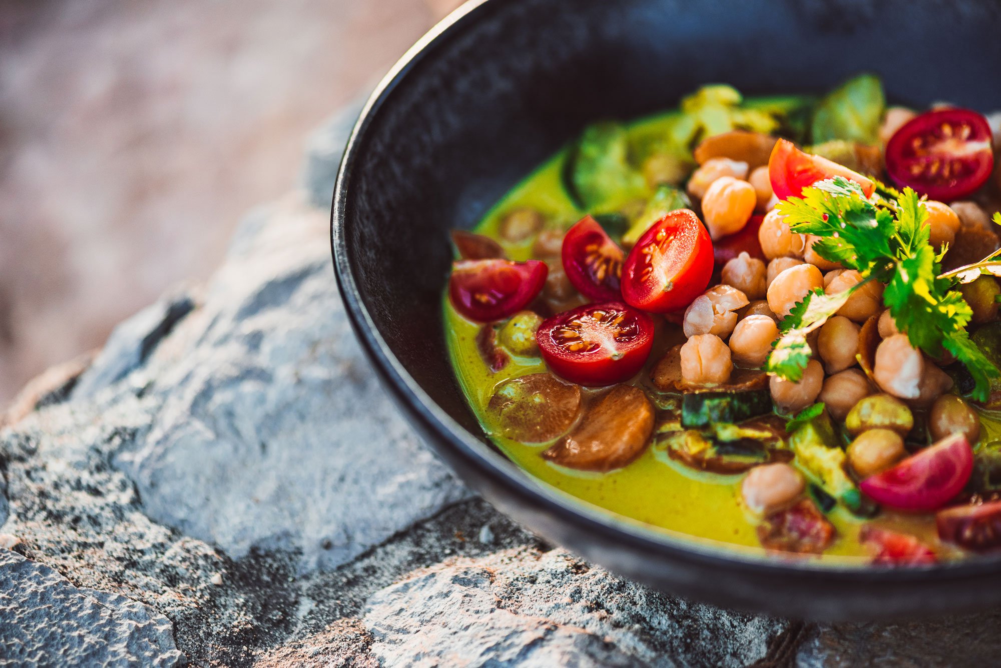 Bowl of vegan curry with vegetables