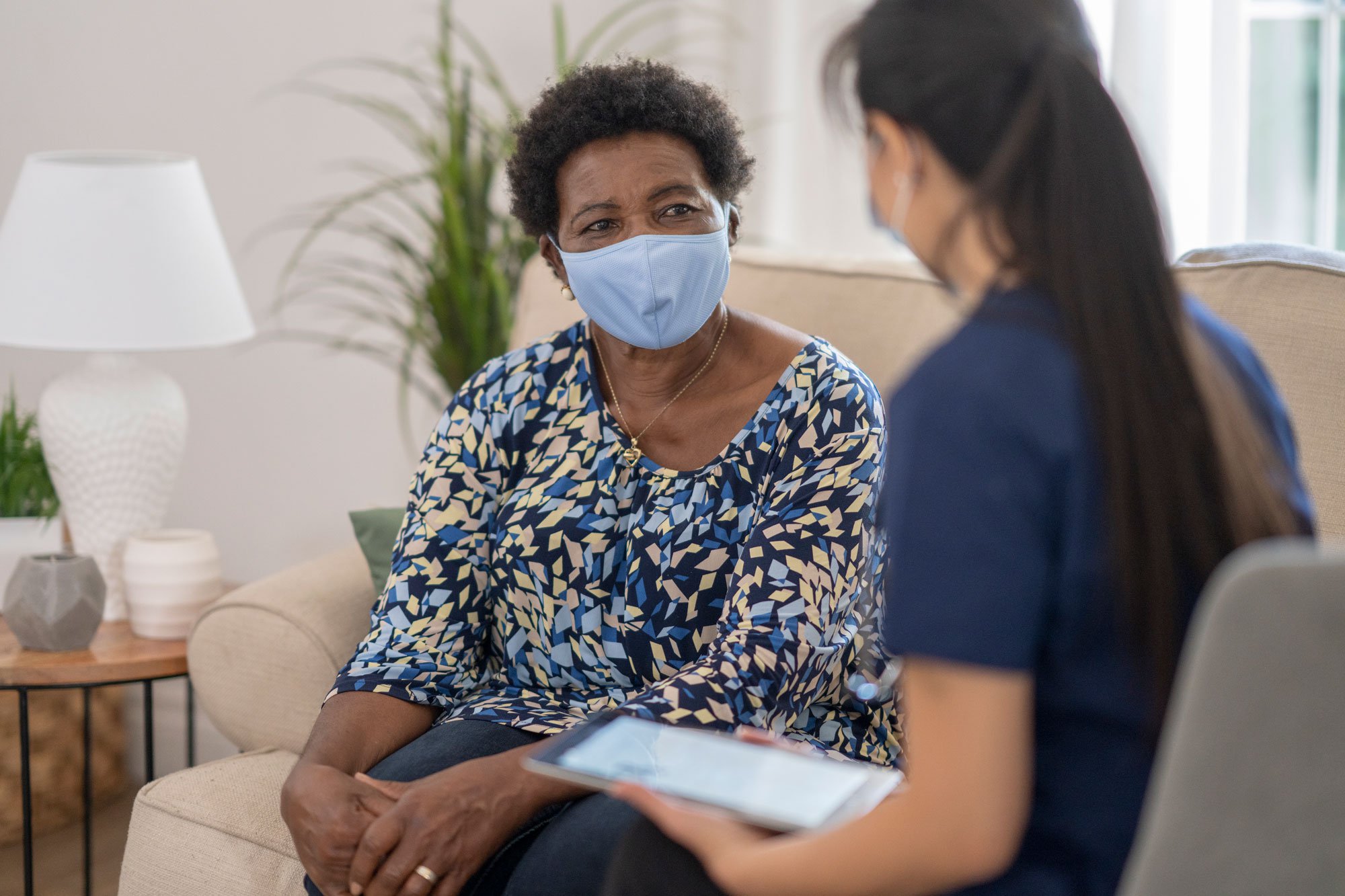 Woman talking to primary care provider