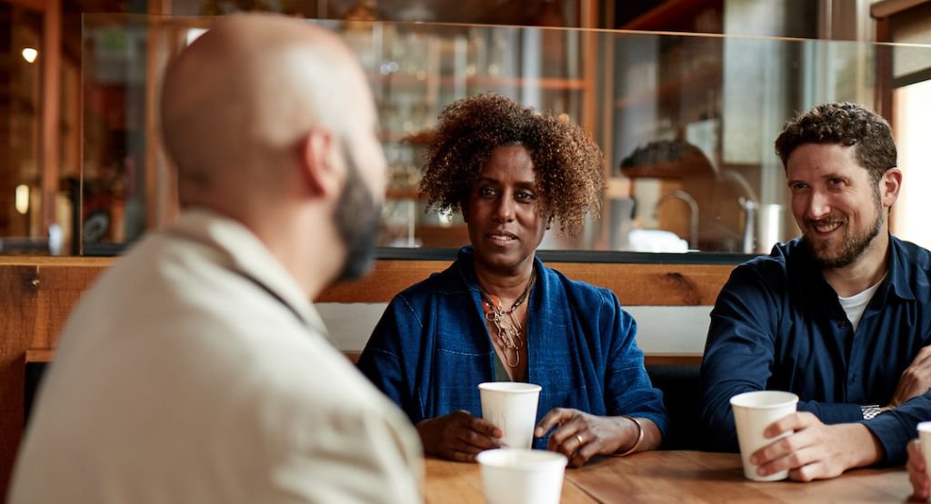 Group of providers talking at a table