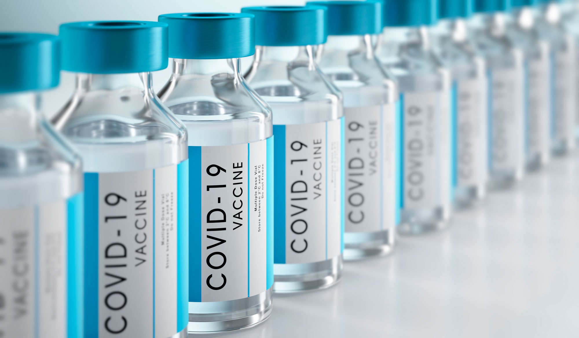 Row of COVID-19 vaccine vials