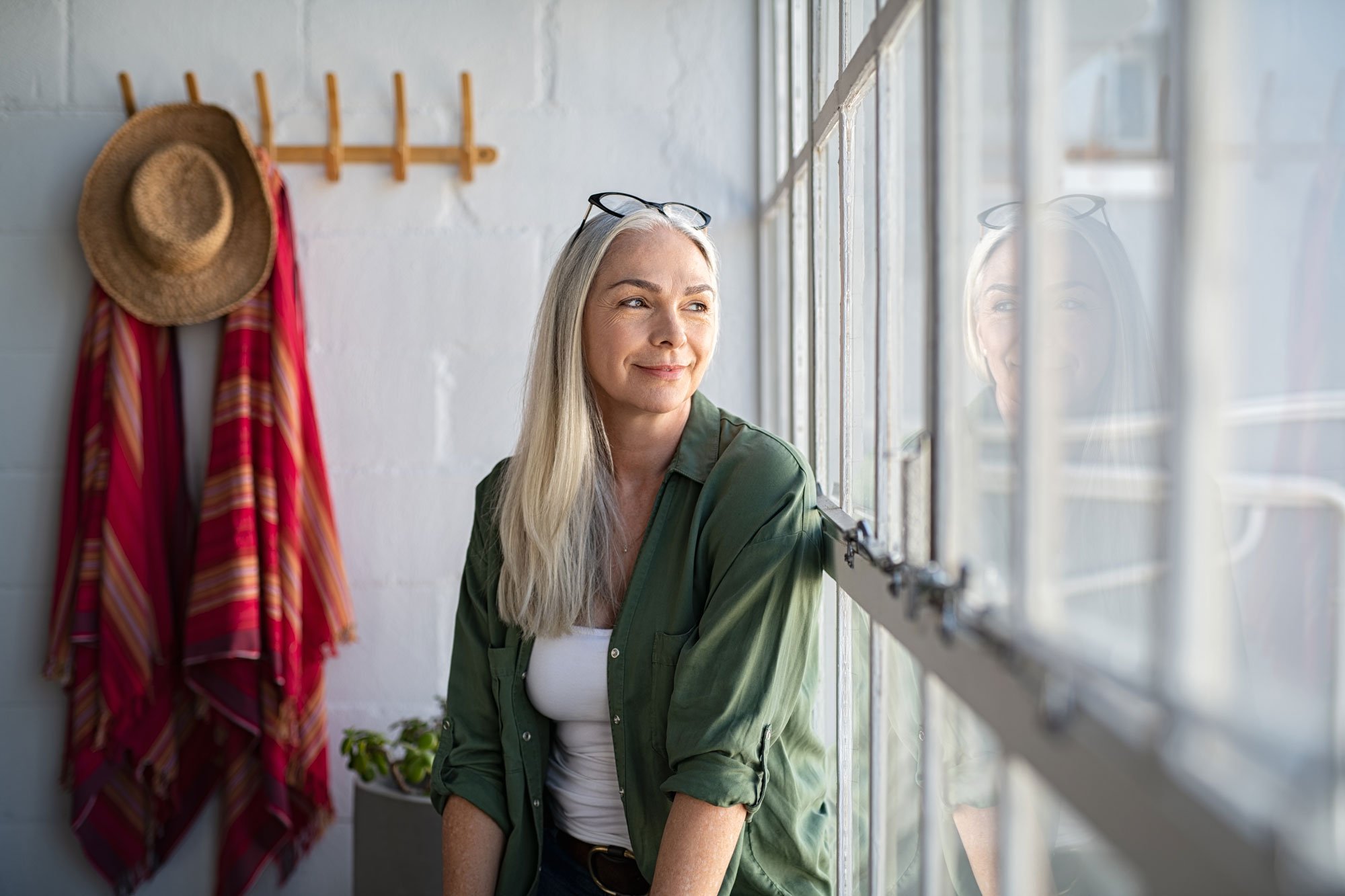 woman thinking and looking out window