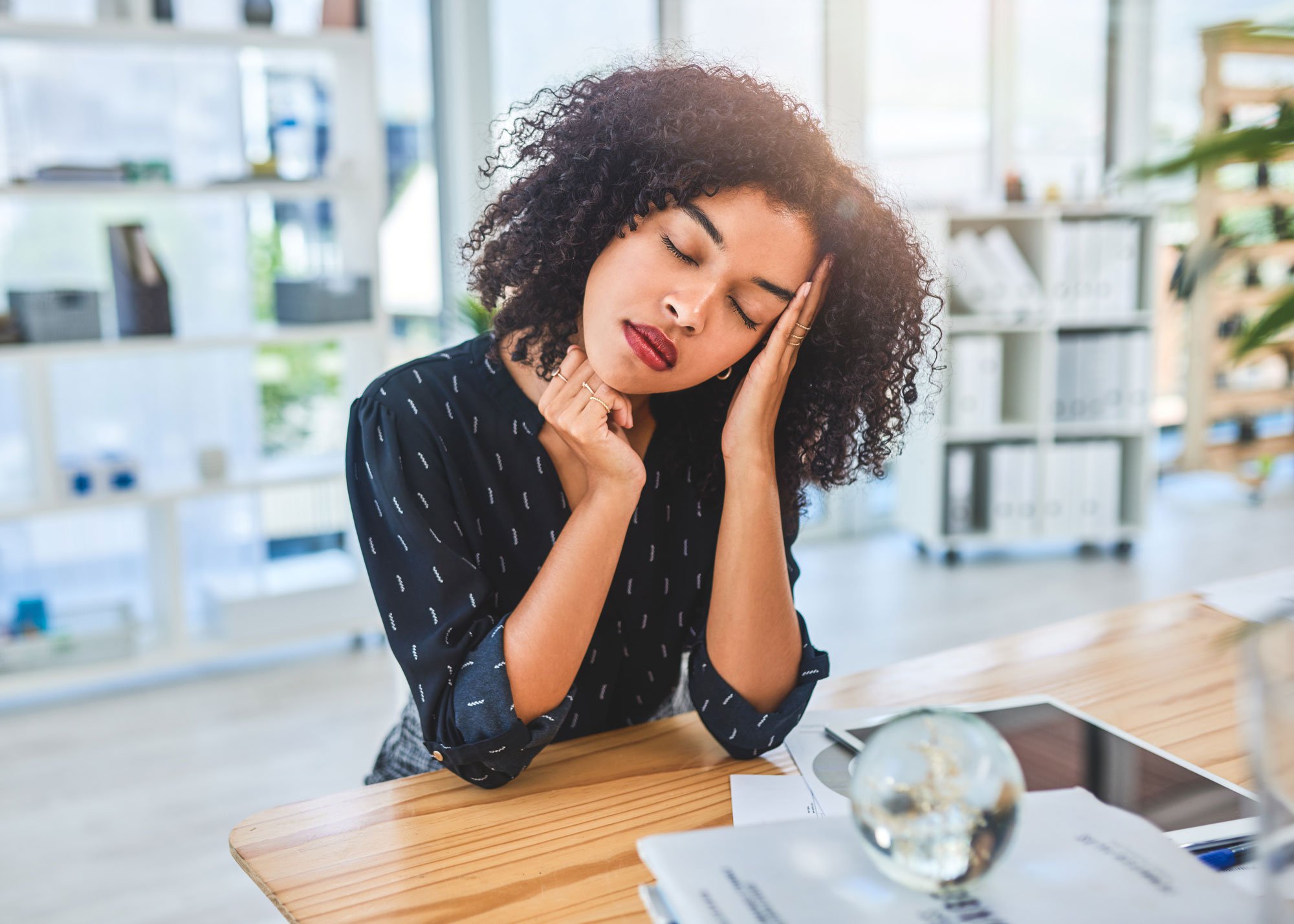 women-resting-head-on-hand.jpg